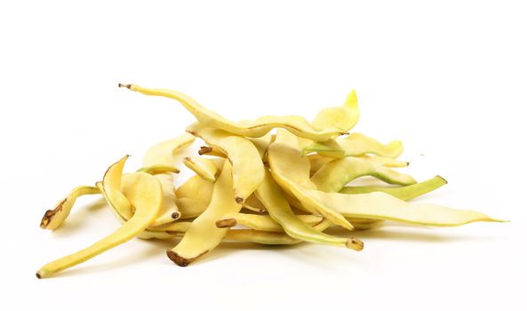 Pile of yellow wax bean pods isolated on the white background
