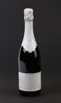 Bottle of champange. Isolated on a black background.