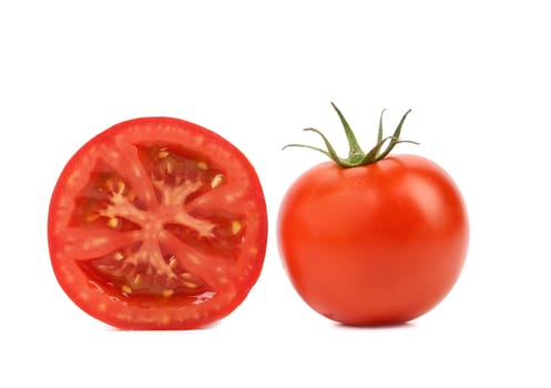 Fresh tomato and half. Isolated on a white background.