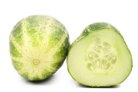 Cucumber and slice. Isolated on a white background.
