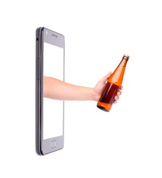 Hand with bottle of beer climbs from phone. White background.