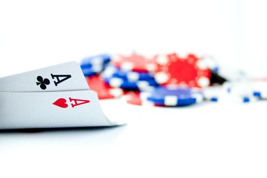 Pair of aces with casino chips