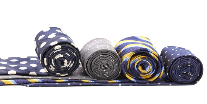 Four multi-colored tie on a white background