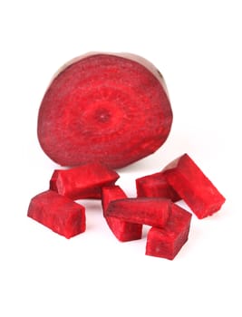 Fresh segments of a beet on a white background