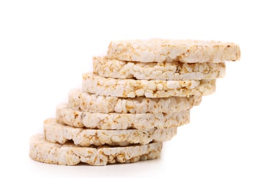Stack of corn crackers. Close up. Isolated