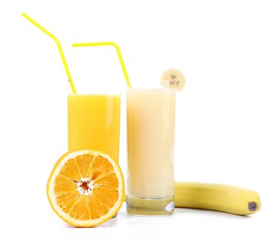 Two glases of orange juice and banana juices on a white