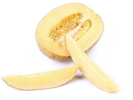 Half of melon with 2 slices on a white background