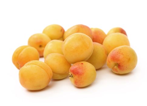 Group of ripe apricots isolated on white background
