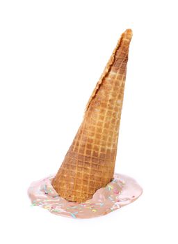 Chocolate ice cream cone fallen. White background.