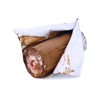 Roll of chocolate ice cream in foil.