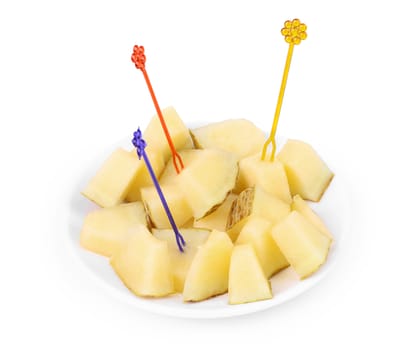 Handful melon slices on plate. White background.