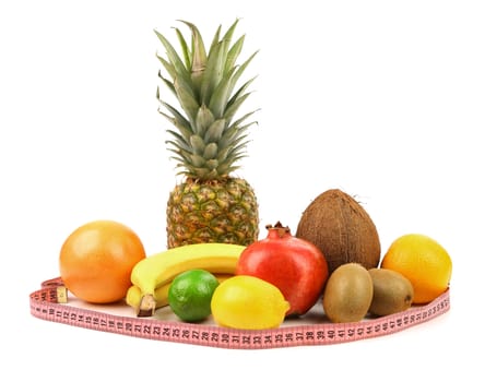 Tape measure and fruit composition. White background.