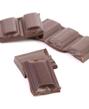 Dark chocolate bars isolated on white background