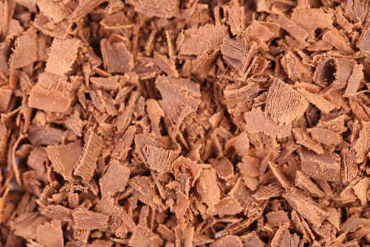 Slices of chocolate. Macro. on white background