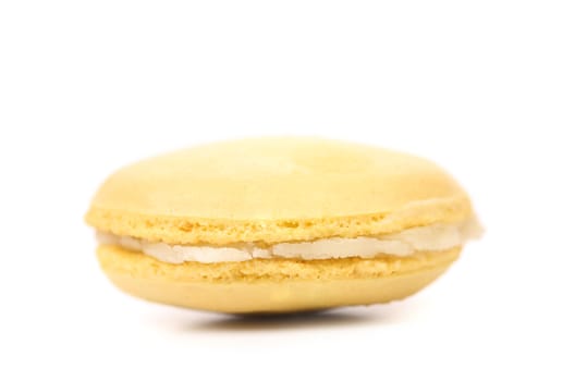 Yellow macaron cakes. Isolated on a white background.