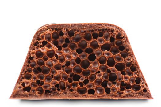 Air porous chocolate. Isolated on a white background.