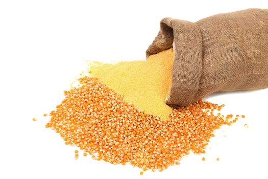 Corn meal and grain in bag isolated on a white background.
