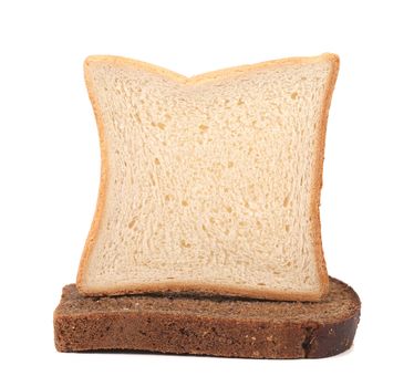 Sailboat made ??of white and brown bread. White background.