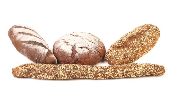 Different brown breads. Isolated on a white background.