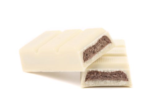 White chocolate bar with filling. White background