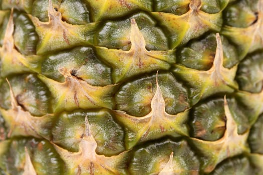 Pineapple fruit close up. Texture. Whole background.