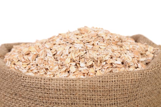 Bag of oatmeal flakes. Close up. There is space for text.