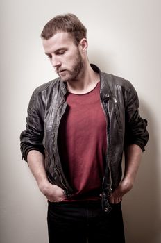 stylish hipster man portrait on gray background
