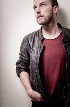 stylish hipster man portrait on gray background