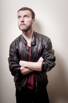 stylish hipster man portrait on gray background