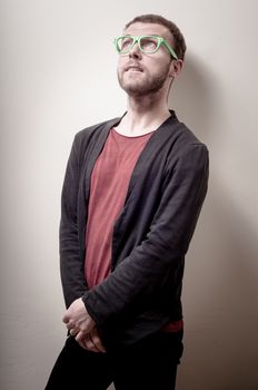 stylish hipster man portrait on gray background