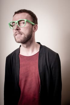 stylish hipster man portrait on gray background