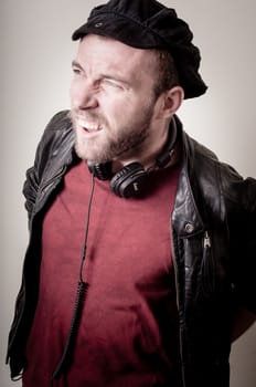stylish hipster man portrait on gray background