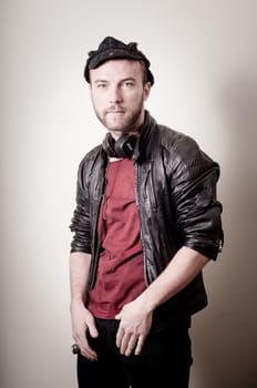stylish hipster man portrait on gray background