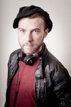 stylish hipster man portrait on gray background