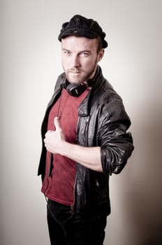 stylish hipster man portrait on gray background