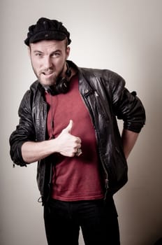 stylish hipster man portrait on gray background