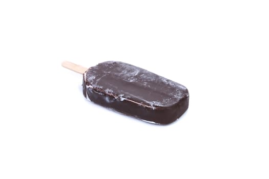 One chocolate vanilla ice cream on stick. Isolated on a white background.