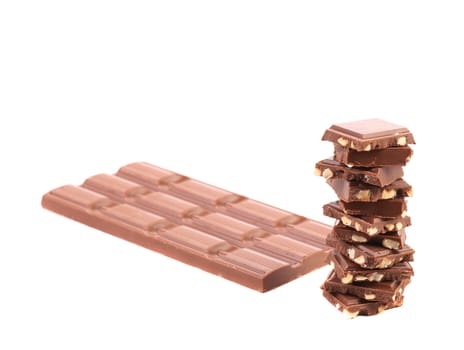 Milk chocolate bar with nuts. Isolated on a white background