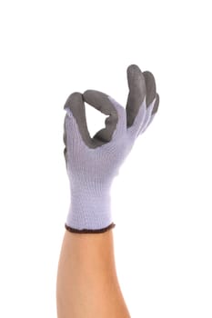 Gloved hand of a construction worker showing an Ok sign. Isolated over white background.