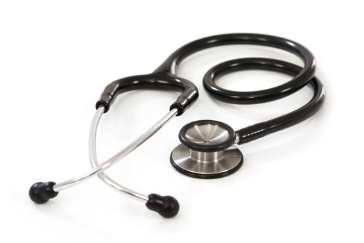 Photo of a stethoscope on white background with slight shadow visible.