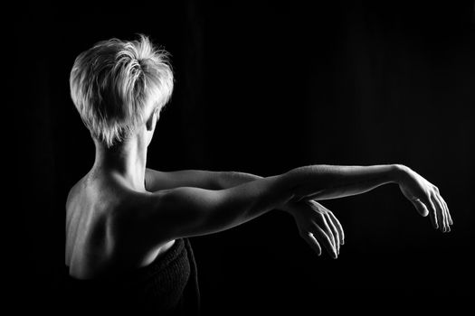 Attractive girl dancing, shot in black and white version