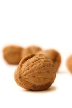 Walnuts on white background