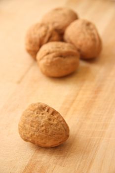 Walnuts on wooden table