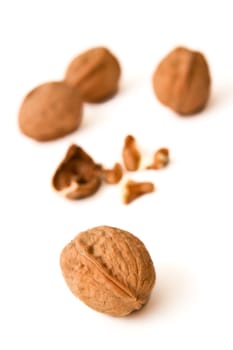 Walnuts on white background