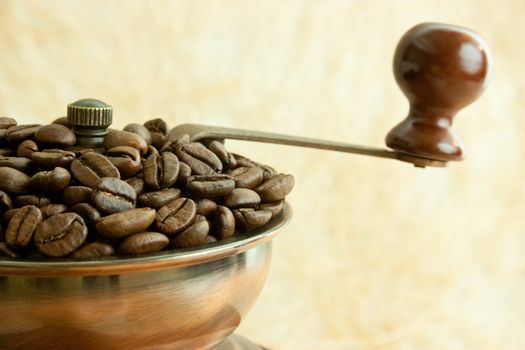 Vintage coffee grinder with coffee beans