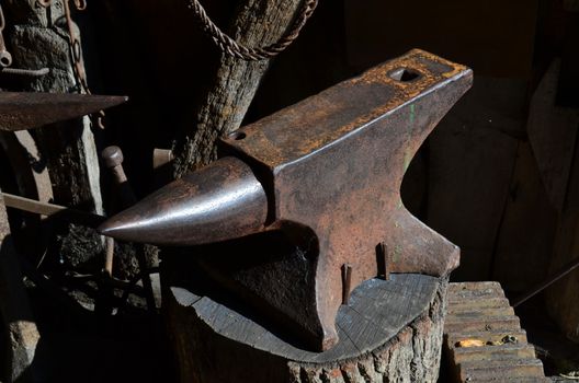 Traditional blacksmiths anvil in a forge.