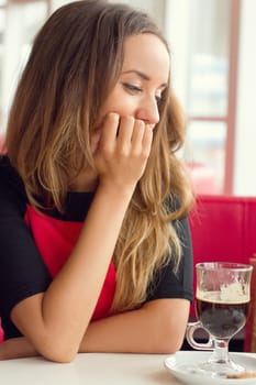woman drinking coffee in the morning at restaurant
