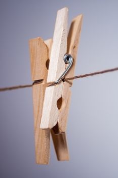 Two clothespins on a string