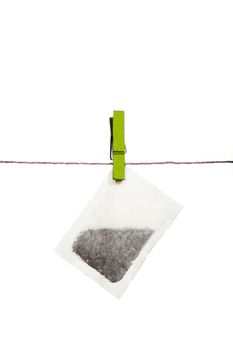 Teabag on a string, held by a clothespin.