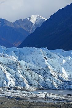 mountain with blue ice glacier in south alaska